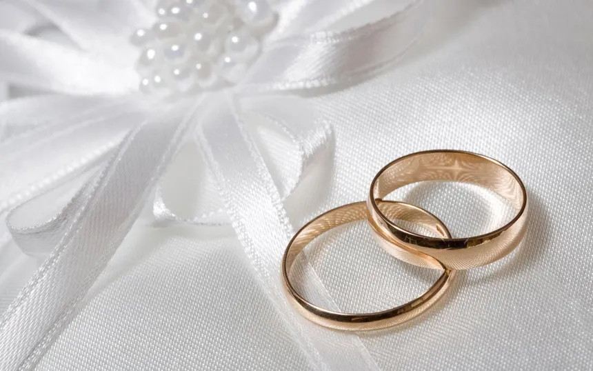 wedding-rings on a white linen cloth